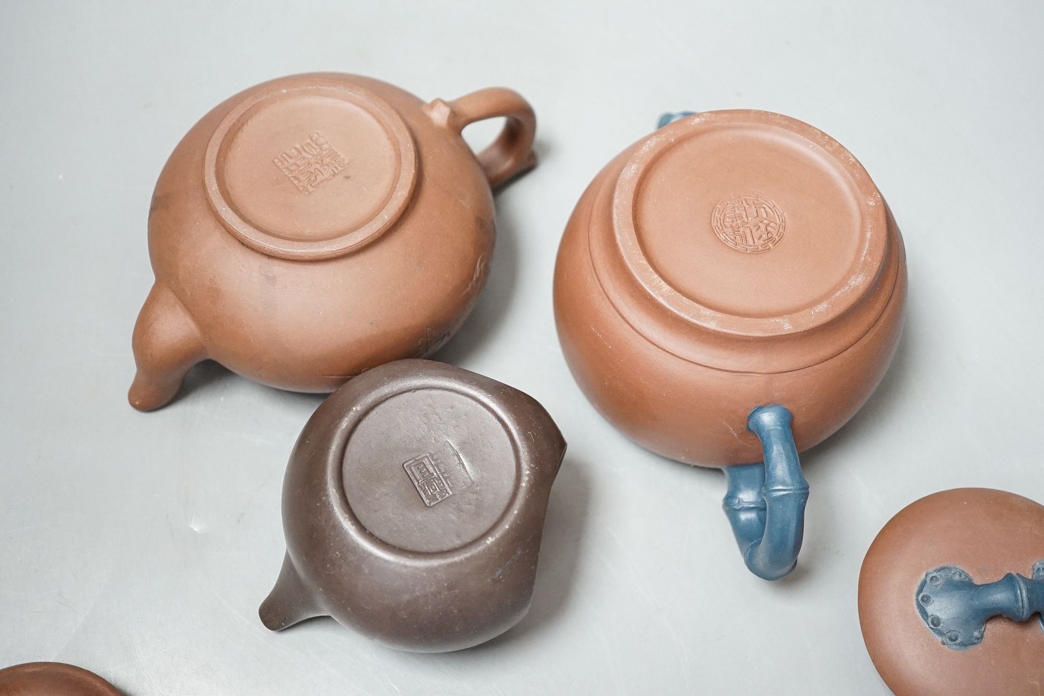 Three Chinese Yixing teapots, tallest 10cm